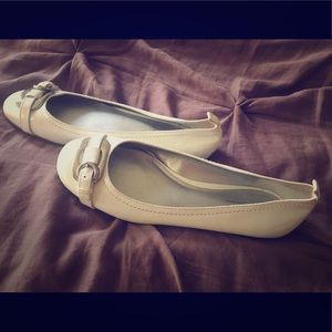 White Ballet Flats with a silver buckle